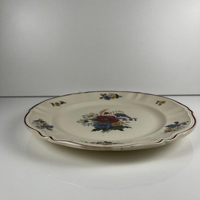 Round cake plate "Agreste" Sarreguemines, 20th century. Dimensions: Diameter: 31.5 cm Height: 3 cm Good overall condition....