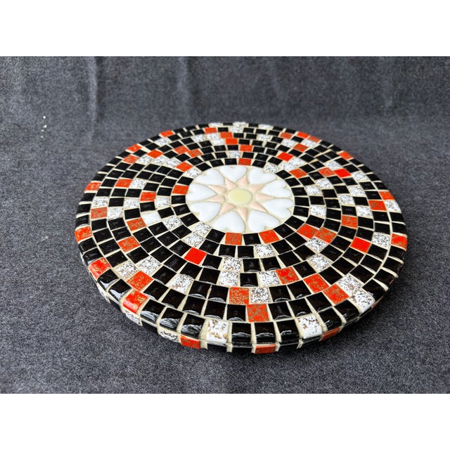 Large, vintage MCM mosaic tile footed trivet with a wood base. Round heart medallion center with small solid black, red...