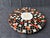 Large, vintage MCM mosaic tile footed trivet with a wood base. Round heart medallion center with small solid black, red...