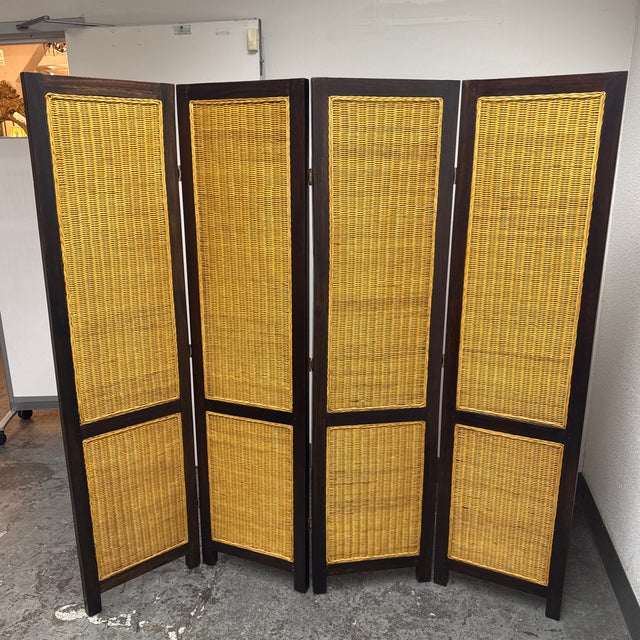 Design Plus Gallery presents a Four-Panel Woven Rattan Folding Screen. This folding screen has four hinged wood panels...