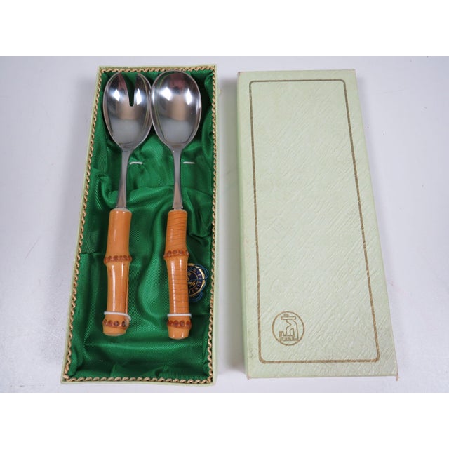 Mid-century German salad serving set produced in Solingen during the 1960s. Crafted in high-grade stainless steel with...