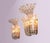 Charming pair of wall sconces with crystal flowers on a brass frame. Measures: height 9.8" in. (25 cm), width 7.9" in....