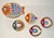 Mid-Century Modern Italian hand-painted DeSimone “Family of Fish” plates, bursting with bold colors and personality....