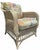 Vintage Henry Link distressed painted wicker armchair featuring the brand’s signature woven construction, sweeping rolled...