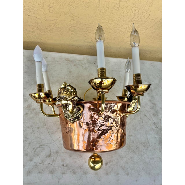 Copper Pot Hanging Chandelier with Brass accents. Embossed Flowers Vintage copper and brass decorative pot chandelier...