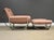 A mid century modern pink vinyl sling lounge chair and ottoman with a chromed steel frame made by Stendig. Made in Italy....