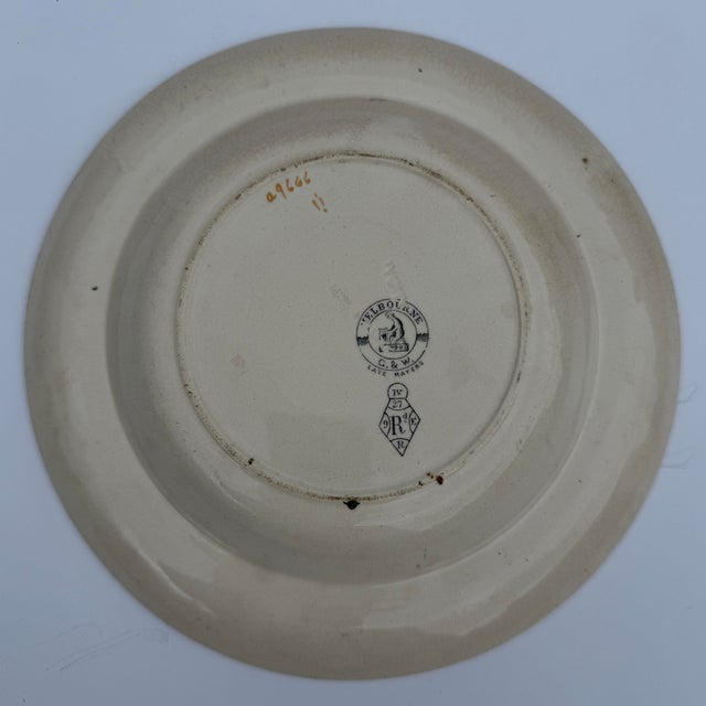 Antique brown transferware plate, part of the "Melbourne" pattern, produced by Gildea & Walker Potteries in Tunstall,...