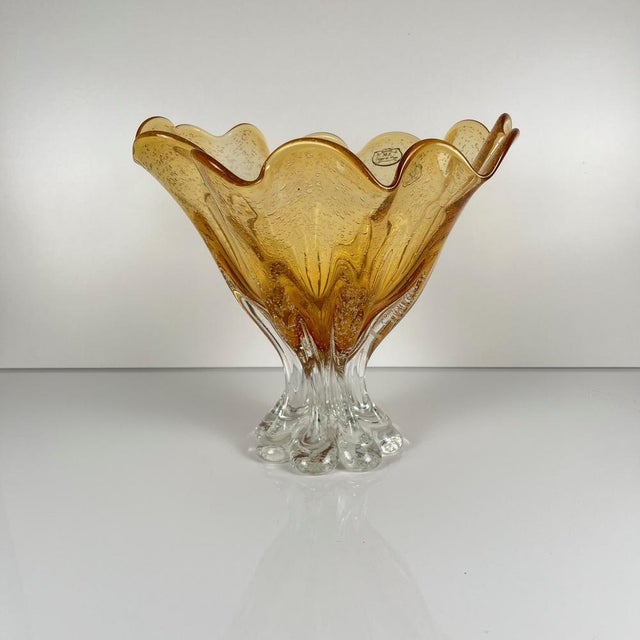 Murano-style amber glass bowl, 1970 Label: "M.F. Sélection Cristal de Paris" Dimensions: Diameter: 27 cm Height: 26 cm...