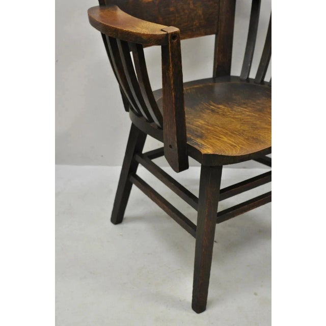 Wood Early 20th Century Antique Arts & Crafts Mission Oak Bowed Spindle Plank Seat School Arm Chair For Sale - Image 7 of 12