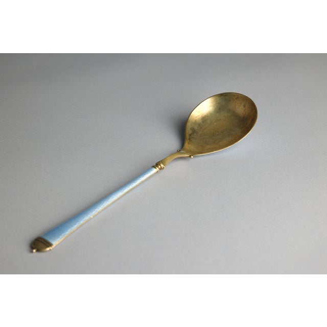 A rare and distinguished large serving spoon by David-Andersen of Oslo, Norway, one of Scandinavia's most celebrated...