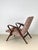 An armchair made by a renowned furniture company Tatra Nabytok in former Czechoslovakia, during the 1960's. Characteristic...