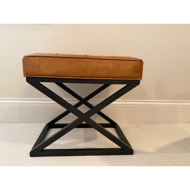 Pottery Barn leather stools with black iron legs. The stools are tufted in a rich brown leather. Excellent condition, like...