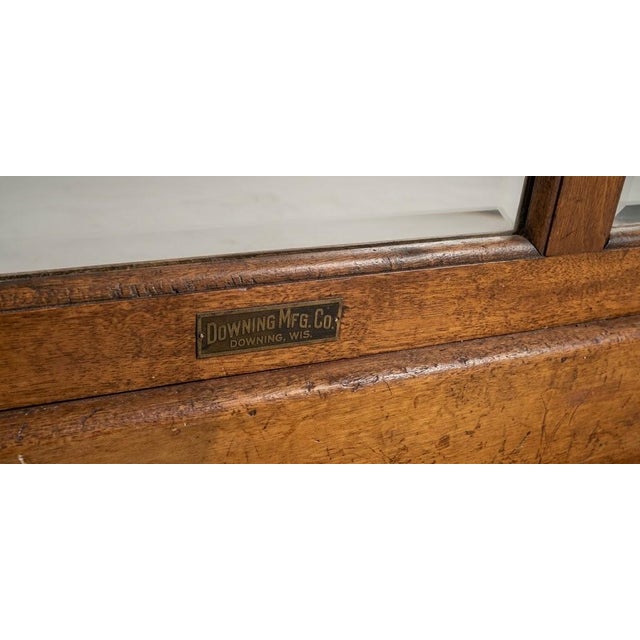 An authentic 1920s mercantile display with an ice box, likely from a patisserie or other food vendor, for Downing...