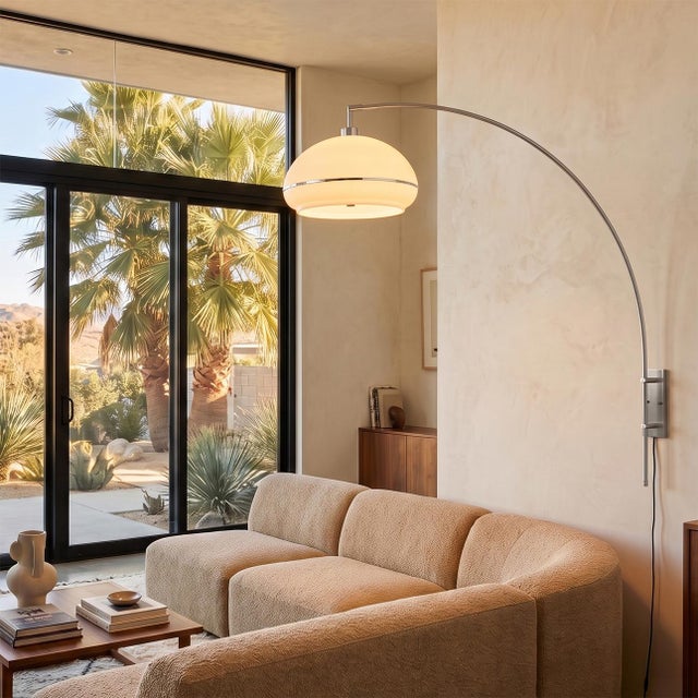 Featuring a space-saving design, the Morelli Wall Mounted Arc Lamp is a modern masterpiece crafted by Peter Morelli in...