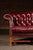 Mid 20th Century Vintage Chippendale-Style Camelback Chesterfield Leather Sofa in Oxblood For Sale - Image 5 of 13