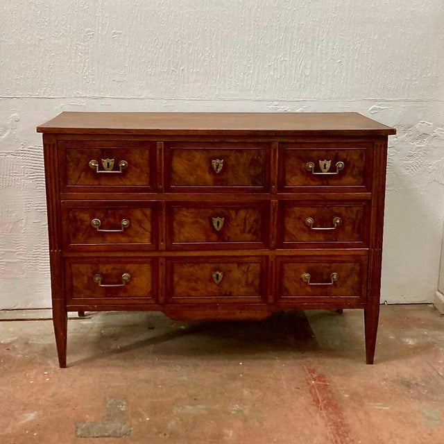 A classically designed French Directoire period commode. Constructed of walnut that’s gained a fantastic patina over time....