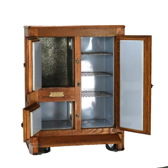 Antique Grand Rapids Refrigerator Co. Oak Three-Door Leonard Icebox c1920 Measures - 42 1/8" x 32" x 19" This antique oak...