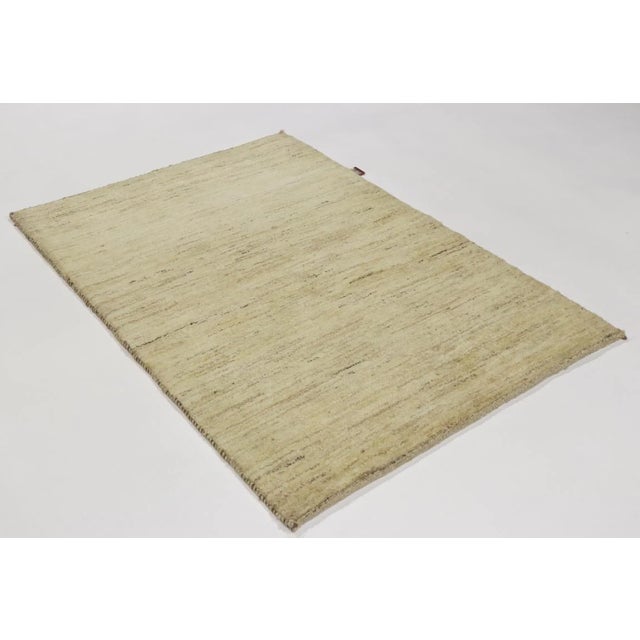Gabbeh rug | size: 149 x 108 cm | knot density: 50,000 – 150,000 knots/m² | material: hand-spun sheep and goat wool |...