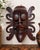 A wonderfully sculptural vintage Indonesian hand-carved wood wall mask inspired by the traditional artistic vocabulary of...