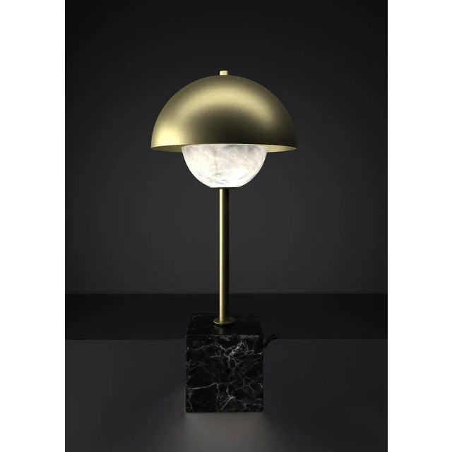 Apollo brushed brass table lamp by alabastro italiano dimensions: d 30 x w 30 x h 74 cm. Materials: white alabaster, nero...