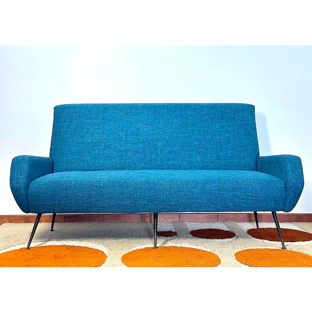Elegant 3-seater sofa designed by gigi radice and produced by minotti in the 1950s. An authentic expression of mid-century...