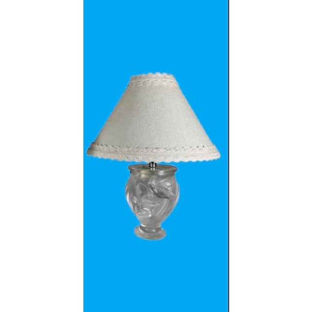 Art deco inspired luxury lighting, this classic Lalique lamp featured two sculpted doves in frosted lead crystal. Made in...