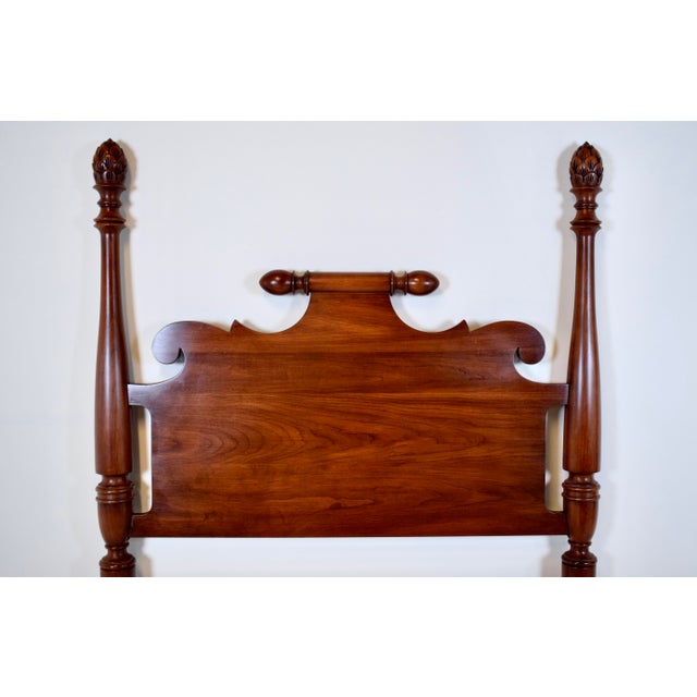 A pair of solid black cherry early American style twin headboards by Henkel-Harris Co. Winchester, Virginia. Embellished...