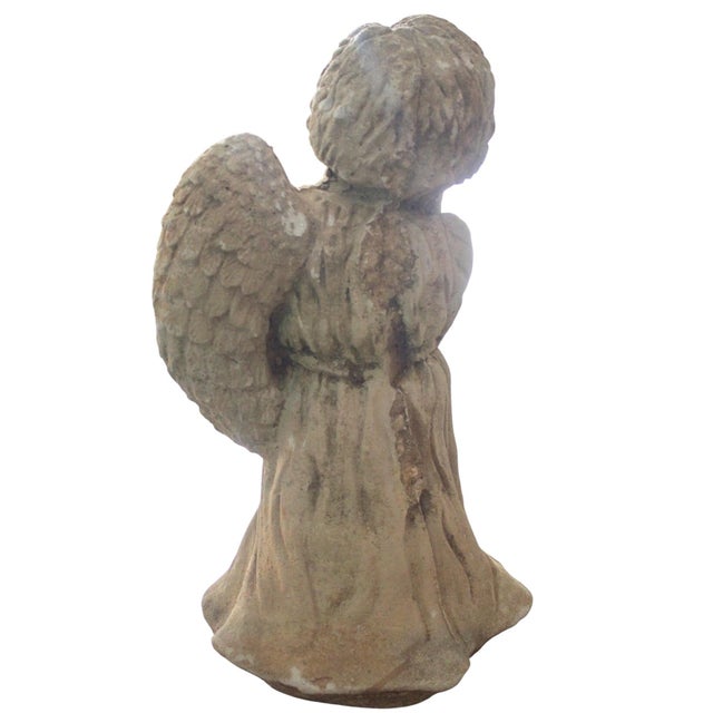 A charming and unusual cast stone garden sculpture depicting a Sleeping Child Angel. Beautifully crafted with exceptional...