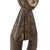The Lega Warega Miniature Figure from Congo is a standing sculpture with a stylized body, showing signs of age and use....