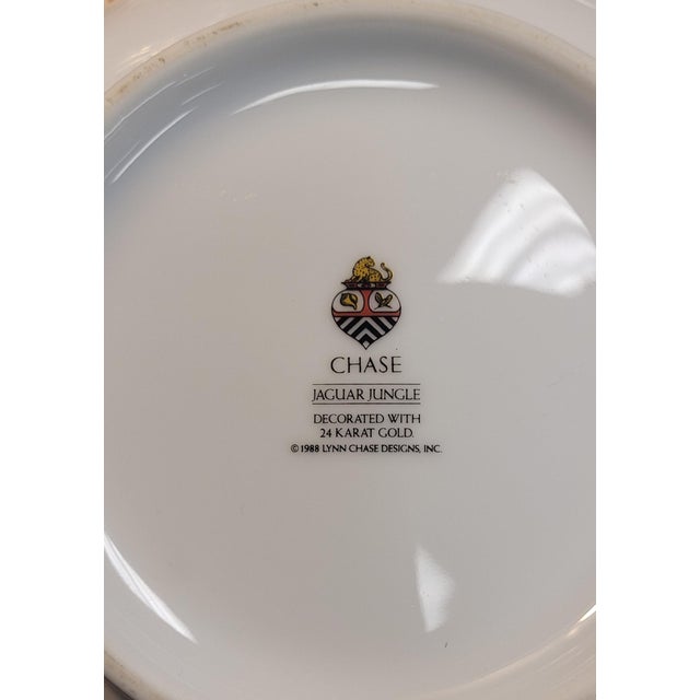 Fine Lynn Chase porcelain Jaguar bowl. Hand painted with a walking Jaguar around the outer rim and flowers and smal...