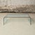 Elevate your space with this exceptional 1950s Italian glass coffee table by Pietro Chiesa for Fontana Arte, a striking...