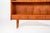 Beautiful vintage mid century bookcase made in warm teak veneer. The cabinet has a clean Scandinavian design with simple...