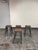 Design Plus Gallery presents a Set of Four Industrial Style Counter Stools. Each stool pairs a squared shaped wood seat...