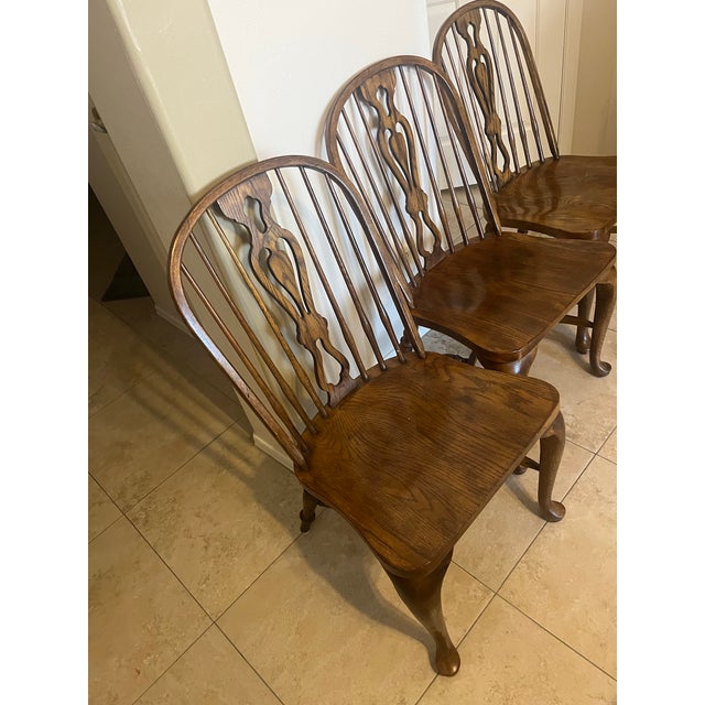 They are unmarked, but appears to be Drexel Heritage. These vintage chairs would be of Drexel's "Rustic Americana" or...