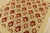 A traditional Suzani rug hand-knotted with fine wool on a cotton foundation. This rug features an all-over botanical...