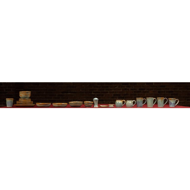2004; Pigeon River Pottery - Pigeon Forge, TN Thirty-six-piece dinnerware set in hand-thrown stoneware, produced by Pigeon...