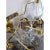 Contemporary scenographic set of two wall sconces in Murano glass. Transparent end fumè "Poliedri" in a gold24k bath of...