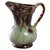 Discover a piece of 1960s German craftsmanship with this ceramic vase, distinguished by its "W. Germany" mark. The vase...