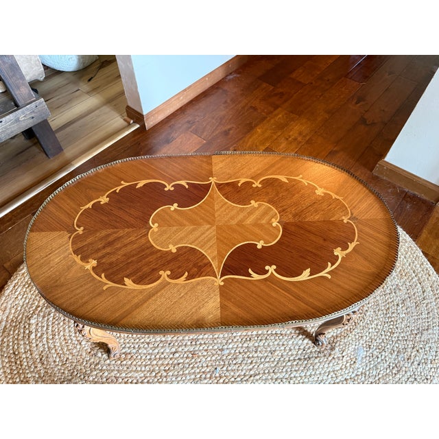 Beautify your living room with this breathtaking vintage coffee table, masterfully crafted in the classic Italian Rococo...
