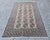 In this listing you will find a magnificent XL Antique Ersari rug. It features a triple pattern chain through the center....