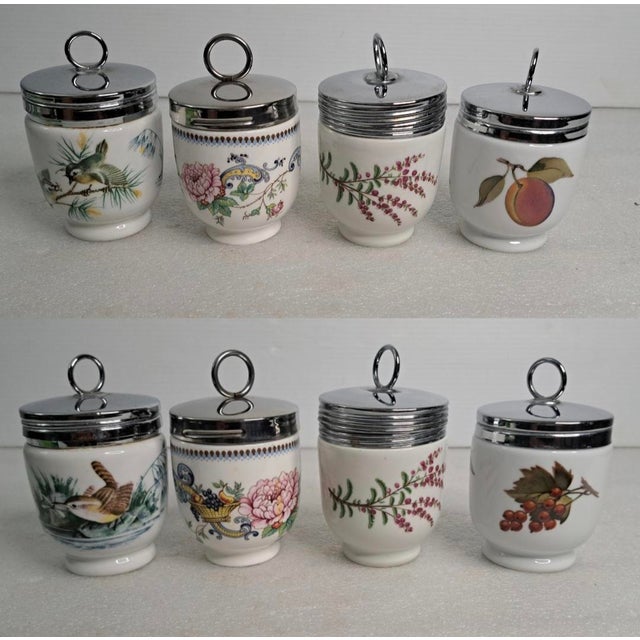 A charming vintage set of four English porcelain egg coddlers, including three by Royal Worcester and one by Crown...