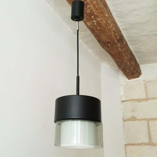 Good condition, with normal signs of wear and scratches, and one small chip. Black lacquered steel and clear and white...