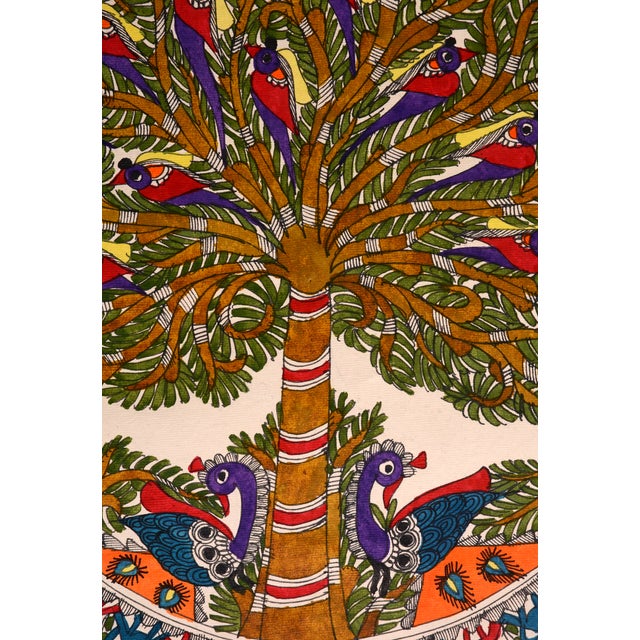 Celebrate the beauty of traditional Indian folk art with this exquisite hand-painted Madhubani painting by Mamta Devi, a...