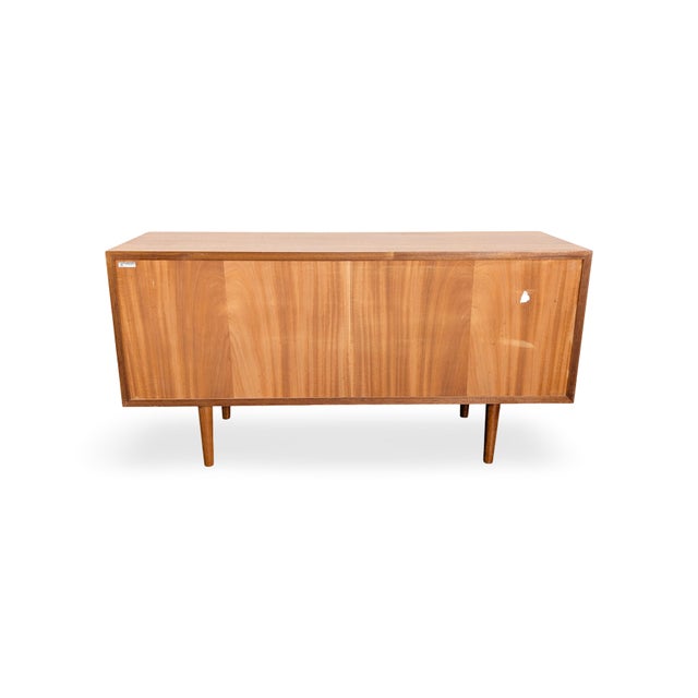 Vintage Danish sideboard from the 1960s. Designed by Svend Aage Larsen, it impresses with its timelessly simple form and...