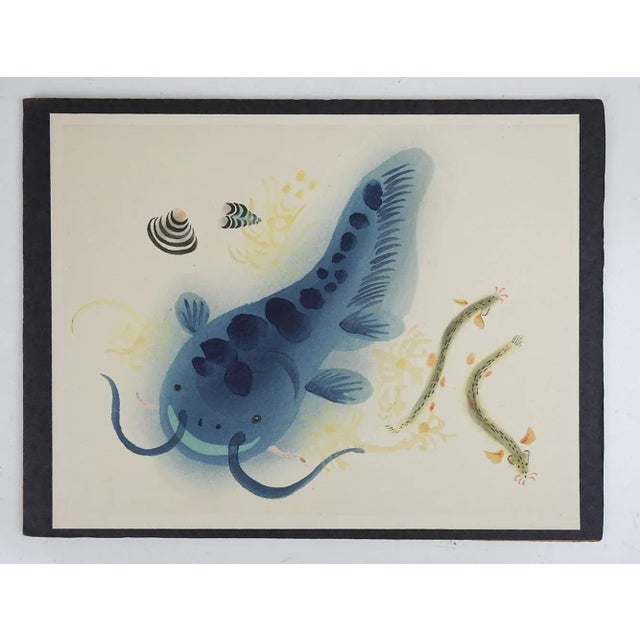 Vintage mid 20th century hand print on paper of a variety of catfish, shells and eels. Japanese mingei folk art hand...