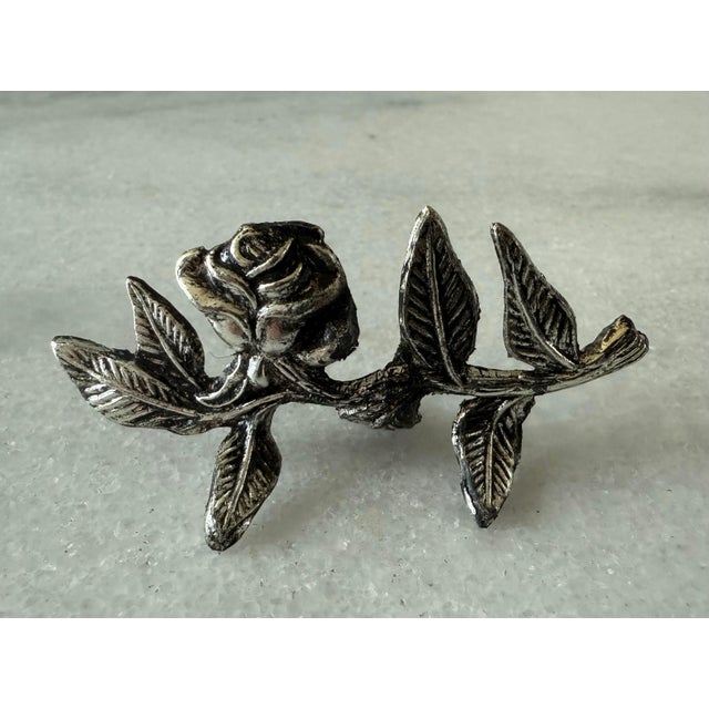 Set of 10 vintage silver plate place card holders in the shape of a blooming rose used to display guest names at a table....