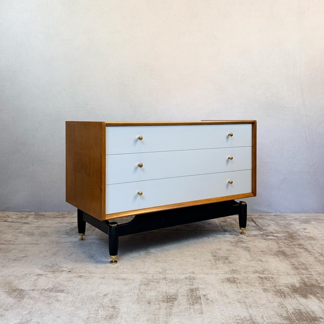 Constructed in solid oak with a plywood carcass, the three drawers run smoothly on their original runners, with the top...