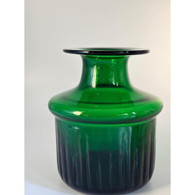 This magnificent mid-century modern art glass vase was designed by the Swedish artist Bertil Vallien for Boda / Åfors...