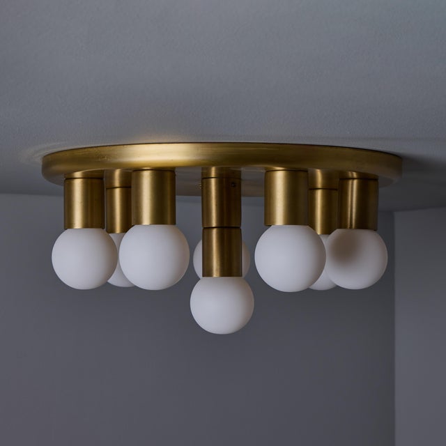 1970s Brass 8-Bulb Flush Mount Attributed to Gaetano Sciolari. A rare 1970s Italian design executed in attractively...