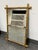 Design Plus Gallery presents a Vintage Giltwood Faux Bamboo Wall Mirror. The rectangular mirror is framed by carved wood...
